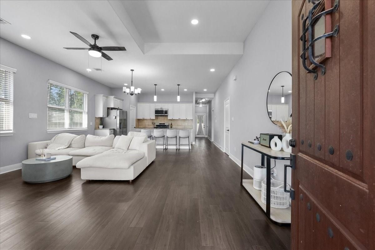 Chandelier, Interior, Kitchen, Living room, Pendant Lights, Recessed Lighting, Stainless Steel Appliances, Wood Texture Flooring