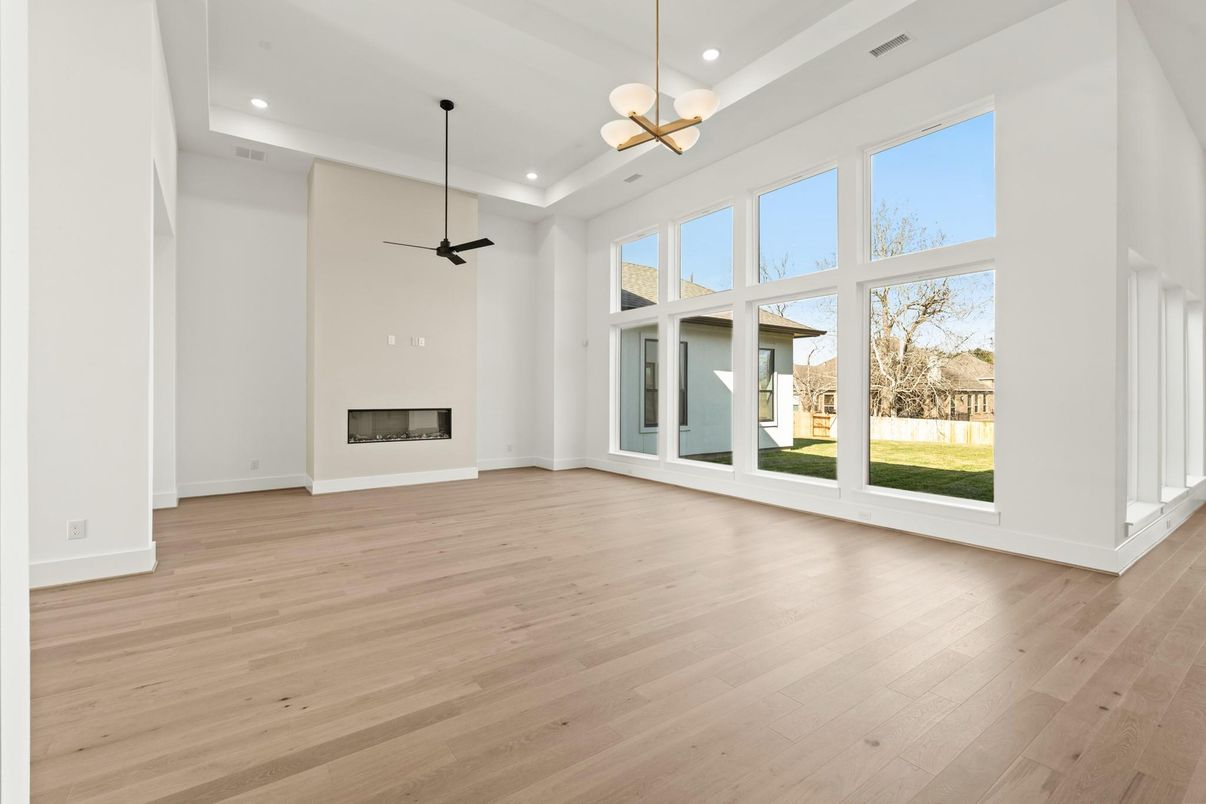 Empty room, Fireplace, Interior, Pendant Lights, Recessed Lighting, Wood Texture Flooring