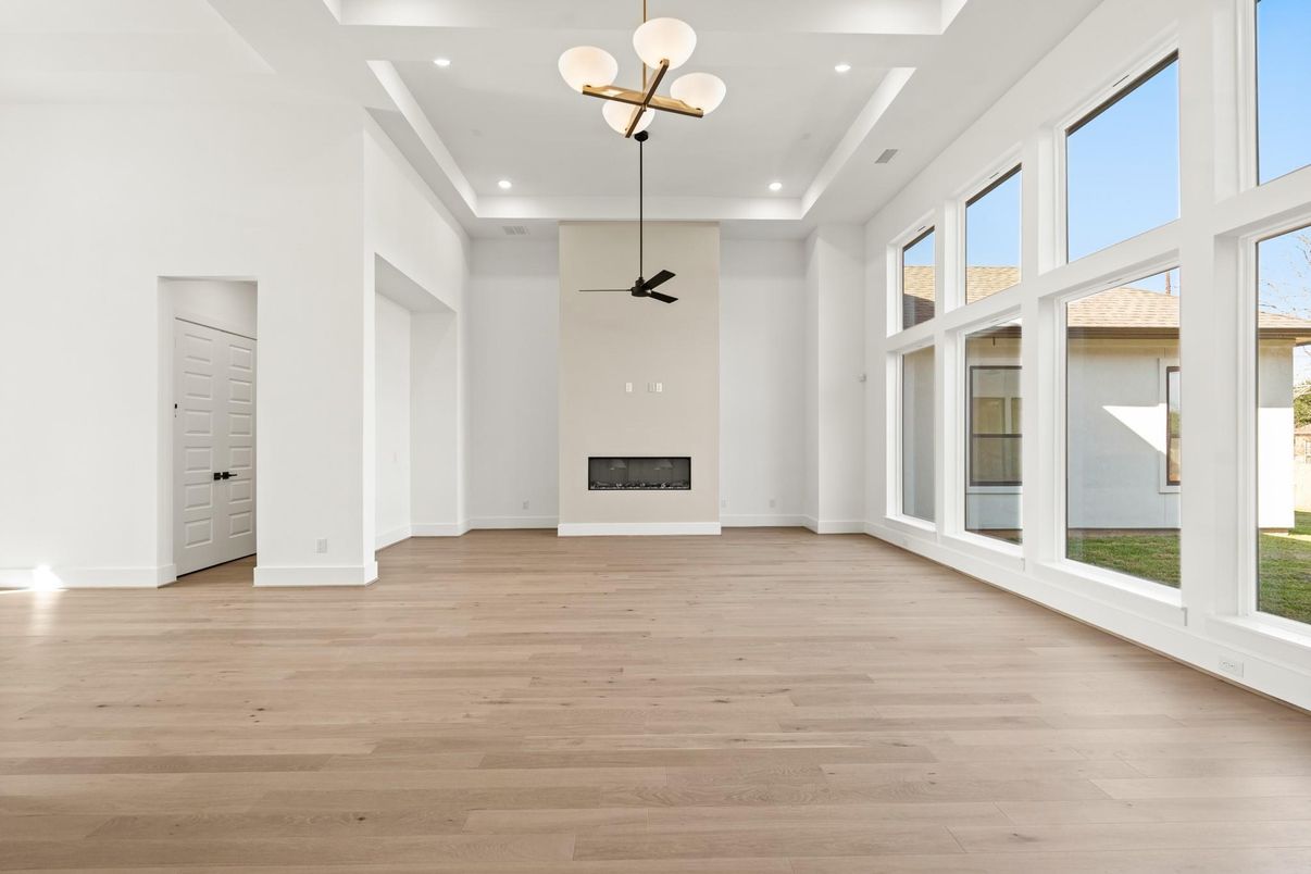 Empty room, Fireplace, Interior, Pendant Lights, Recessed Lighting, Wood Texture Flooring