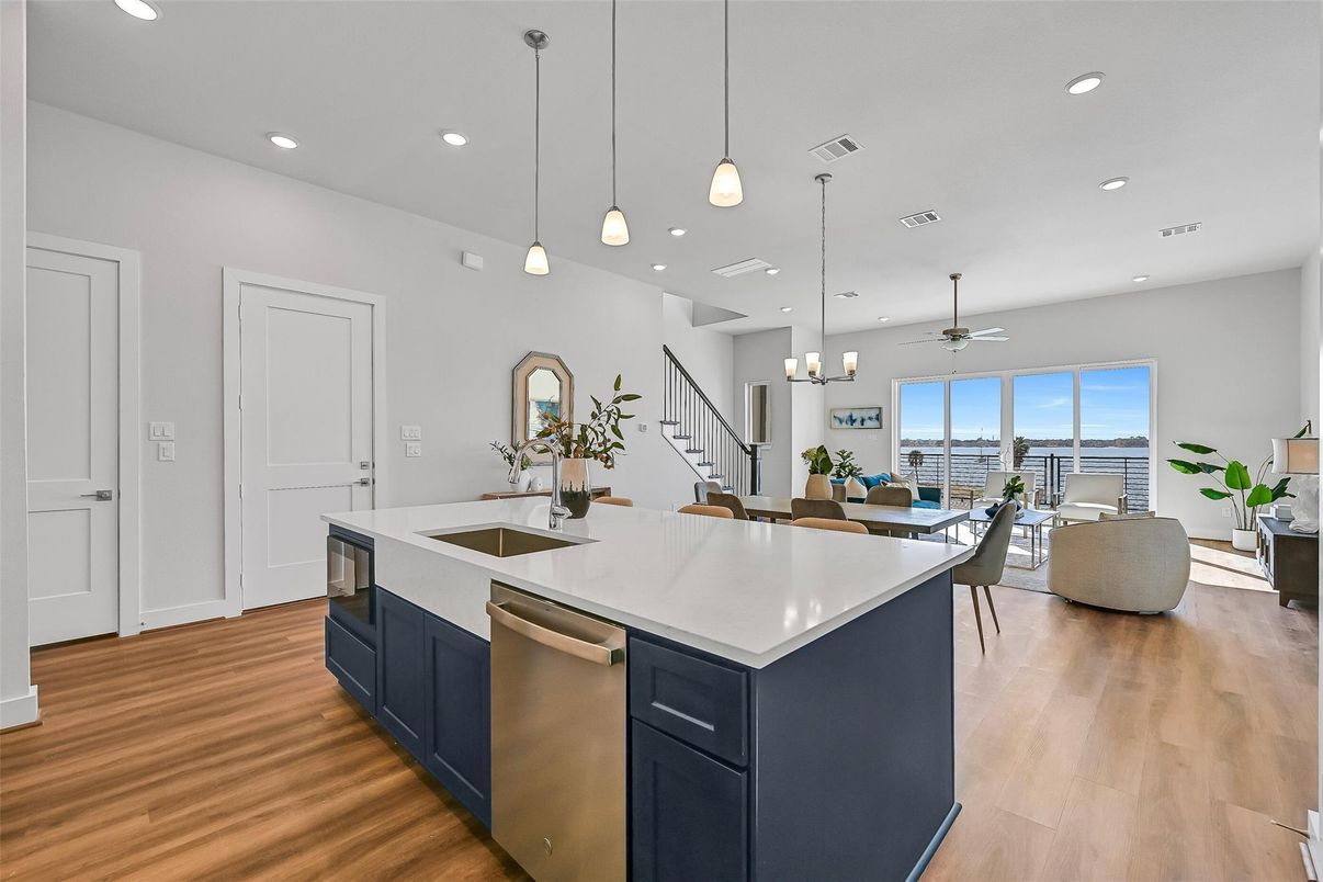 Dining room, Interior, Kitchen, Living room, Pendant Lights, Recessed Lighting, Stainless Steel Appliances, Wood Texture Flooring