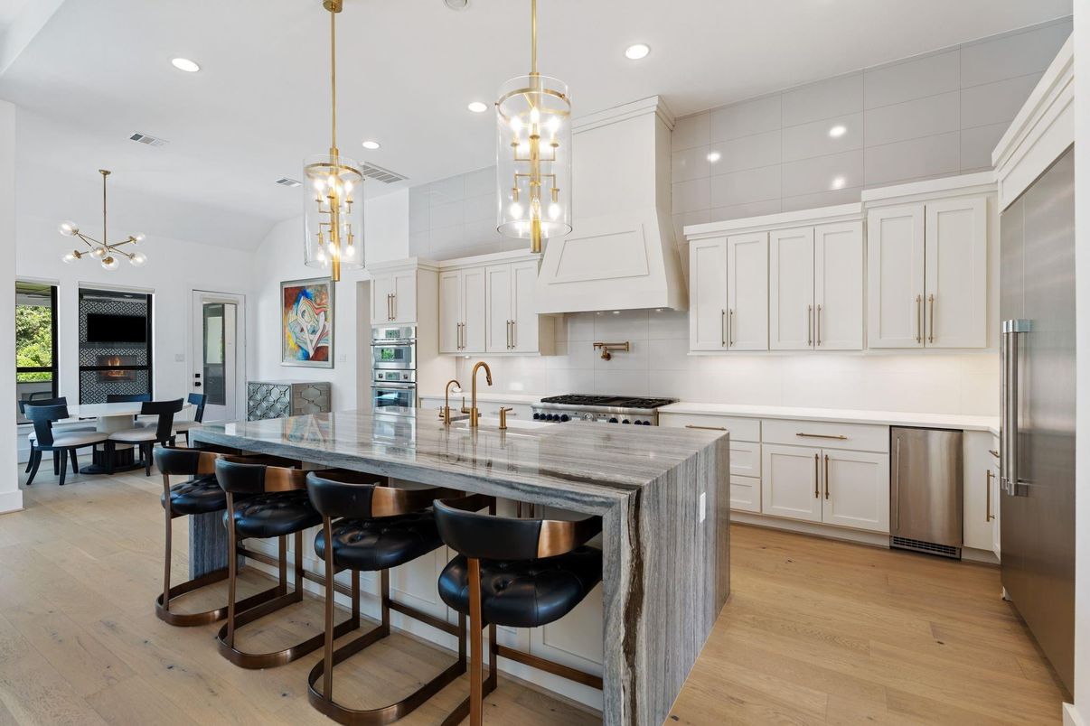 Dining room, Interior, Kitchen, Pendant Lights, Recessed Lighting, Stainless Steel Appliances, Wood Texture Flooring