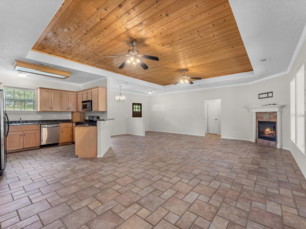 Fireplace, Interior, Kitchen, Pendant Lights, Stainless Steel Appliances, Wooden Ceilings