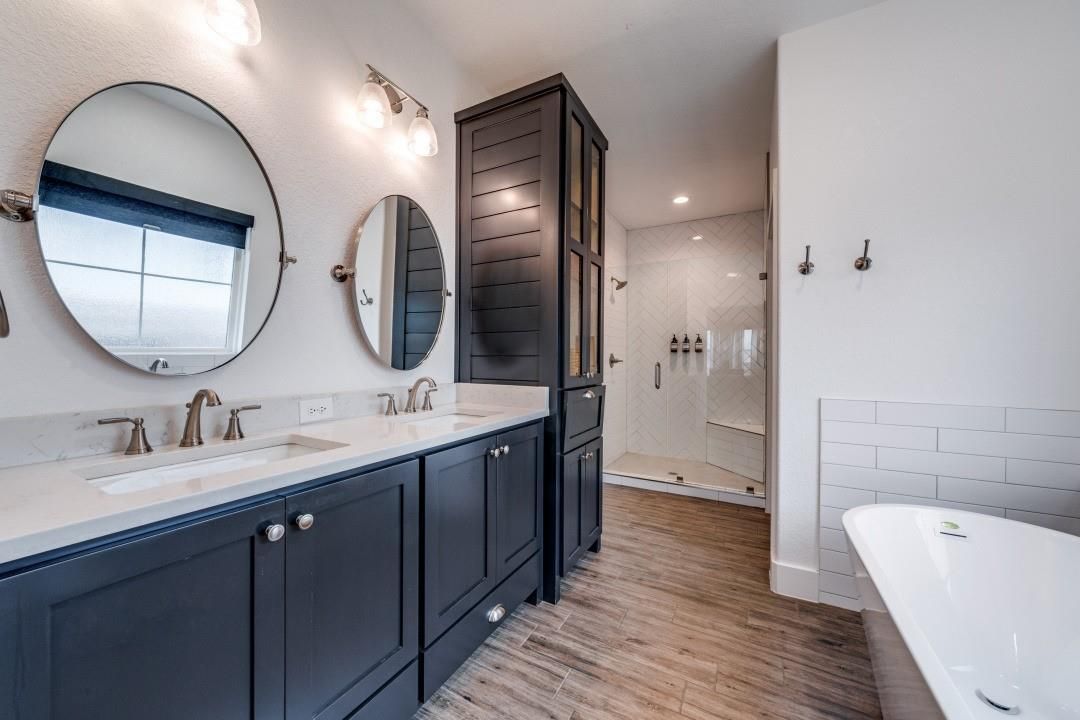 Bathroom, Dual Sink Vanities, Glass Shower, Interior, Recessed Lighting, Wood Texture Flooring