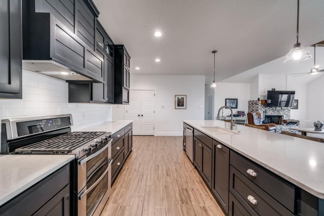 Fireplace, Interior, Kitchen, Pendant Lights, Recessed Lighting, Wood Texture Flooring