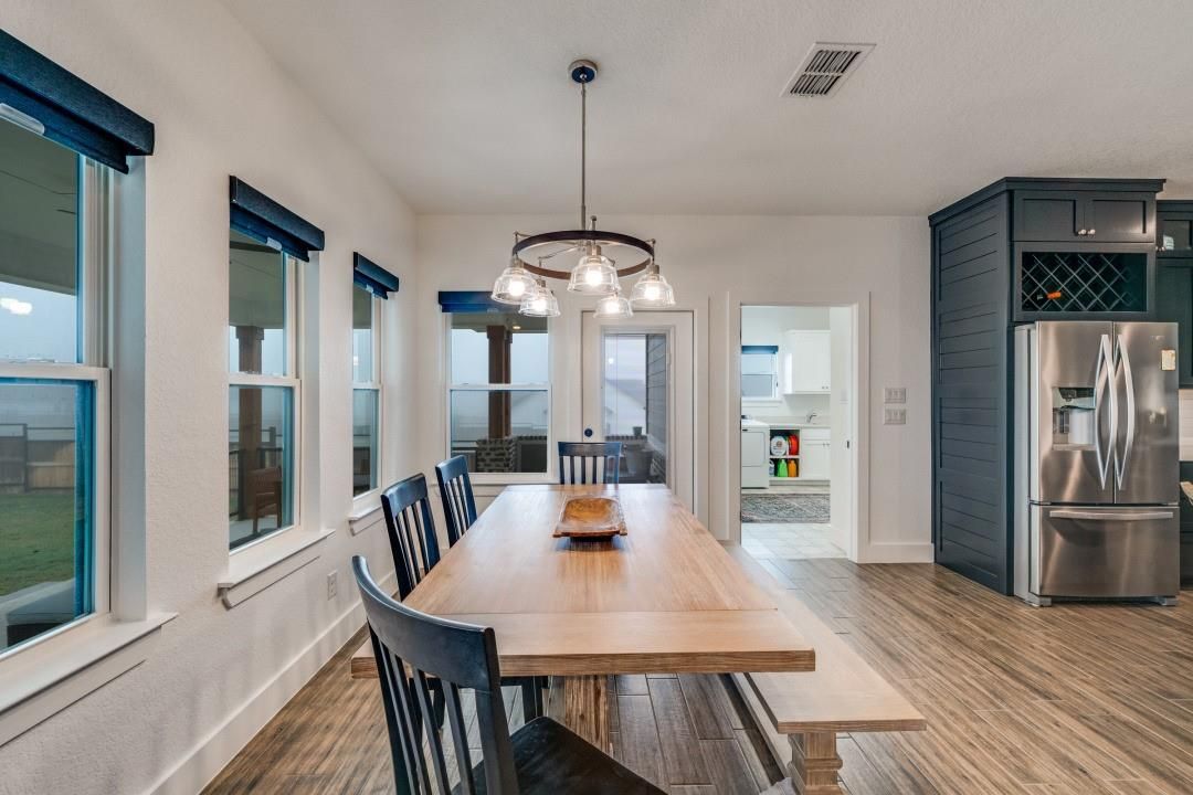 Dining room, Interior, Kitchen, Pendant Lights, Stainless Steel Appliances, Wood Texture Flooring