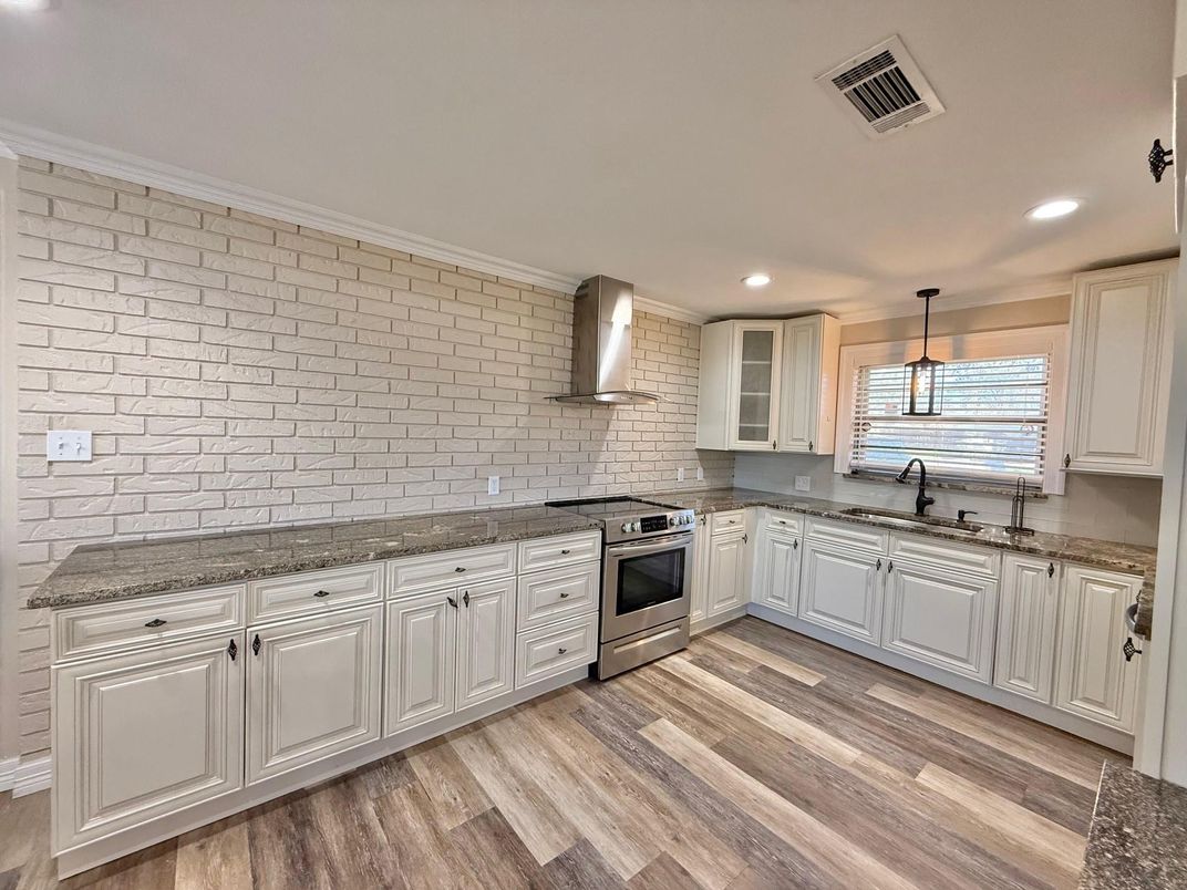 Interior, Kitchen, Pendant Lights, Recessed Lighting, Stainless Steel Appliances, Stone Walls, Wood Texture Flooring