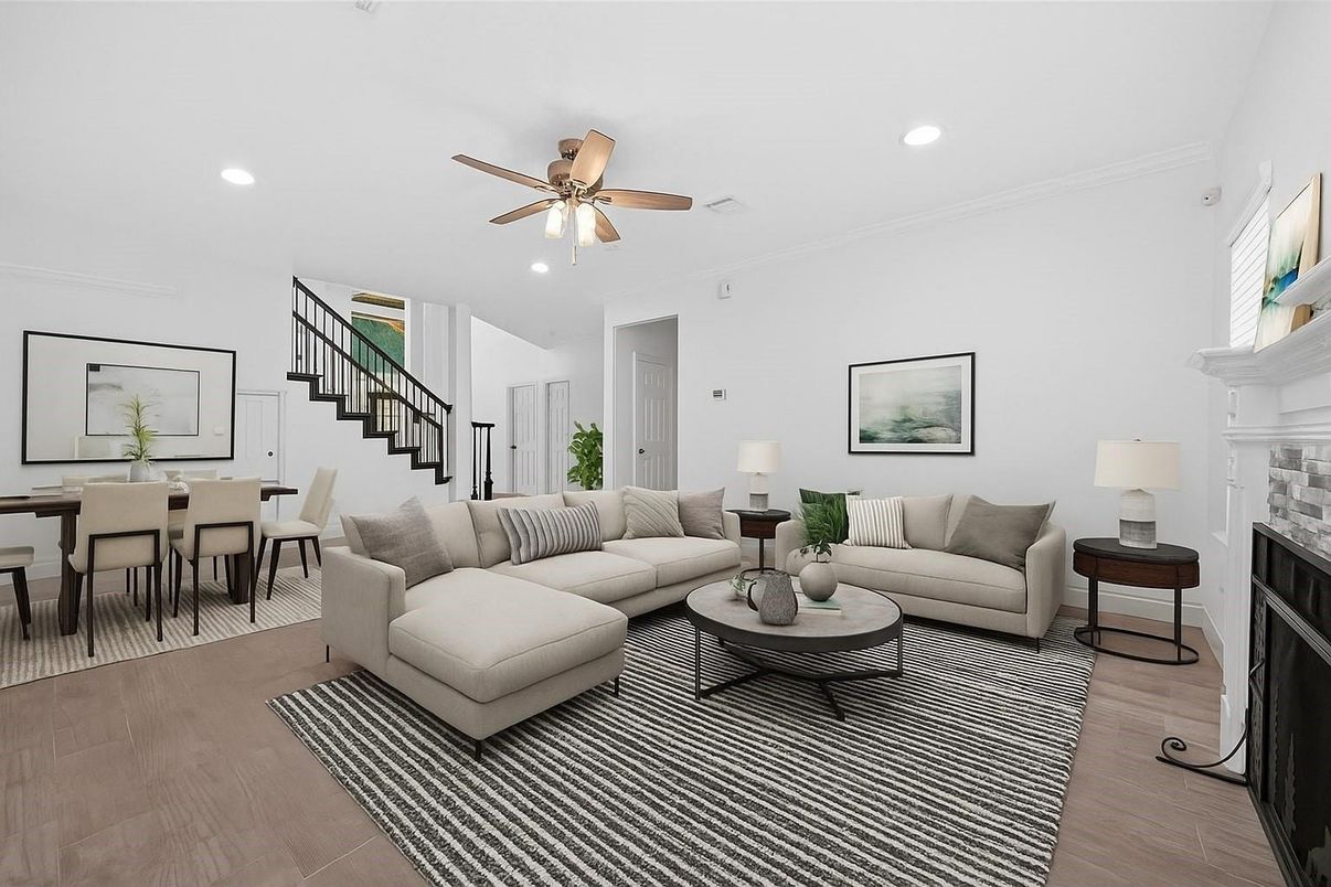 Dining room, Fireplace, Interior, Living room, Recessed Lighting, Wood Texture Flooring