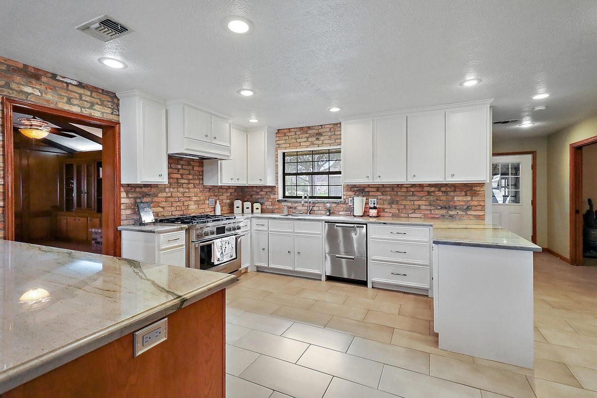 Interior, Kitchen, Recessed Lighting, Stainless Steel Appliances, Stone Walls