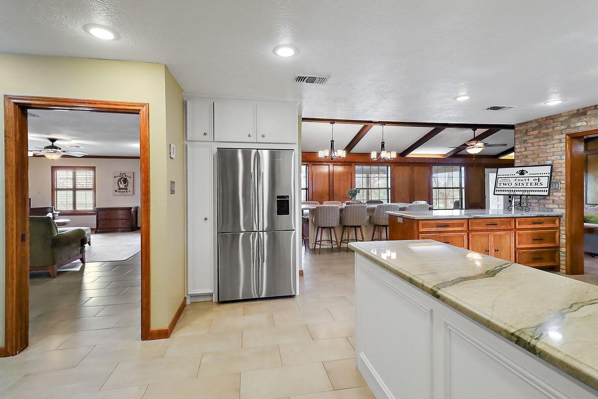 Interior, Kitchen, Pendant Lights, Recessed Lighting, Stainless Steel Appliances, Stone Walls