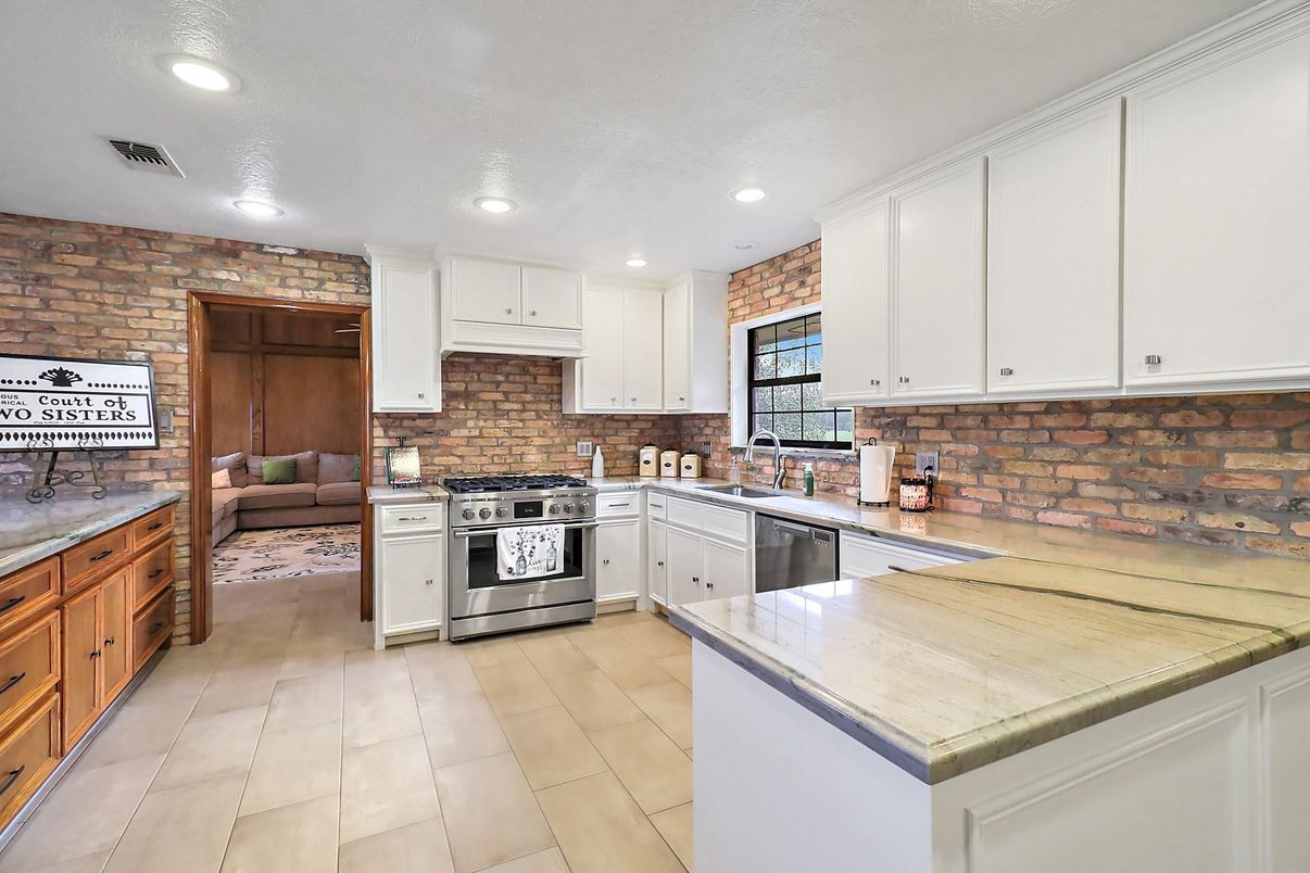 Interior, Kitchen, Recessed Lighting, Stainless Steel Appliances, Stone Walls
