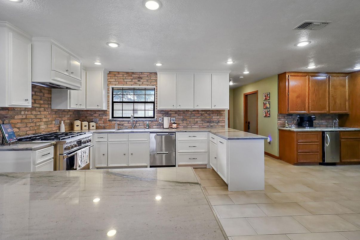 Interior, Kitchen, Recessed Lighting, Stainless Steel Appliances, Stone Walls