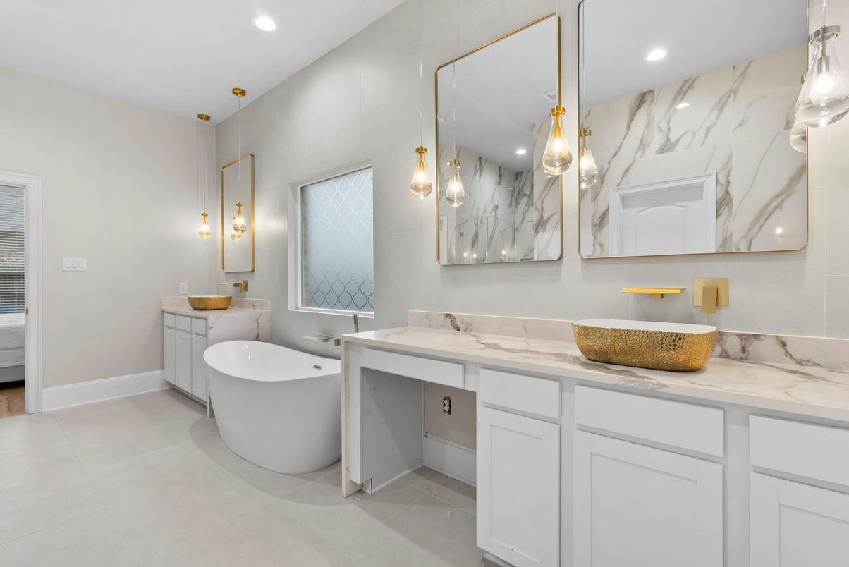 Bathroom, Dual Sink Vanities, Free Standing Baths, Interior, Marble Walls, Pendant Lights, Recessed Lighting