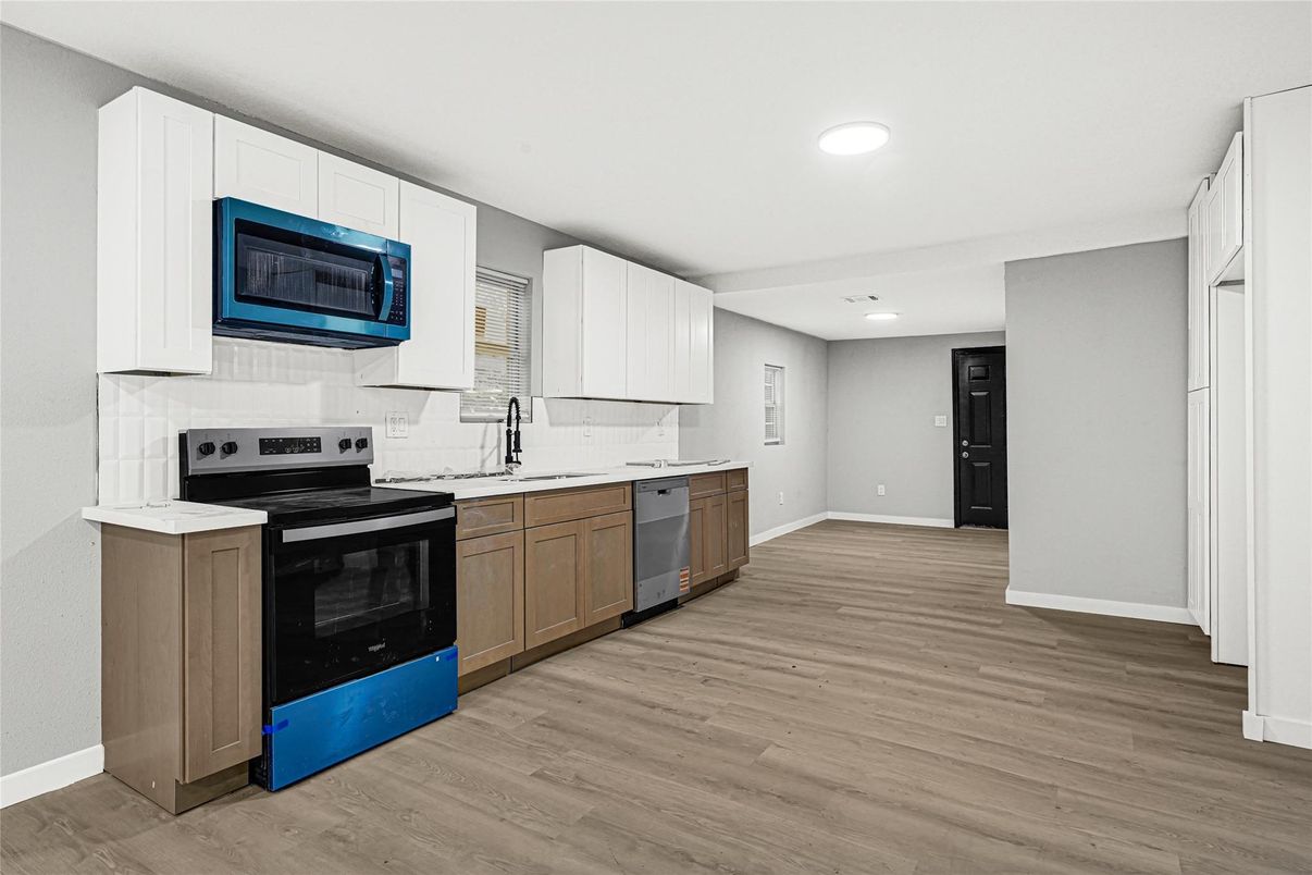 Interior, Kitchen, Recessed Lighting, Stainless Steel Appliances, Wood Texture Flooring