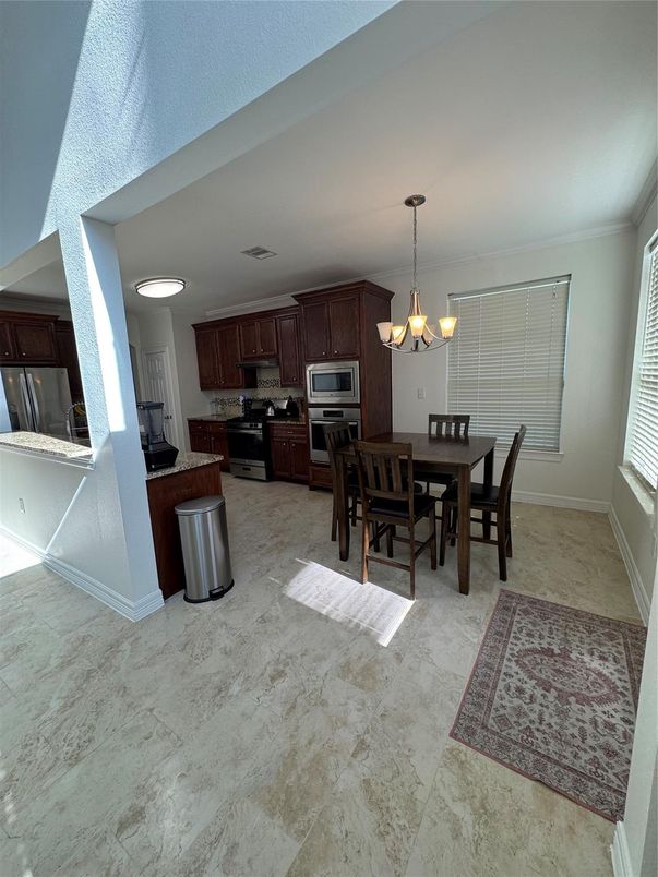 Chandelier, Dining room, Interior, Kitchen, Stainless Steel Appliances
