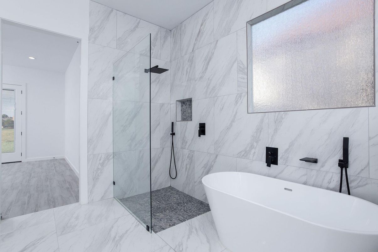 Bathroom, Free Standing Baths, Glass Shower, Interior, Marble, Marble Walls, Recessed Lighting