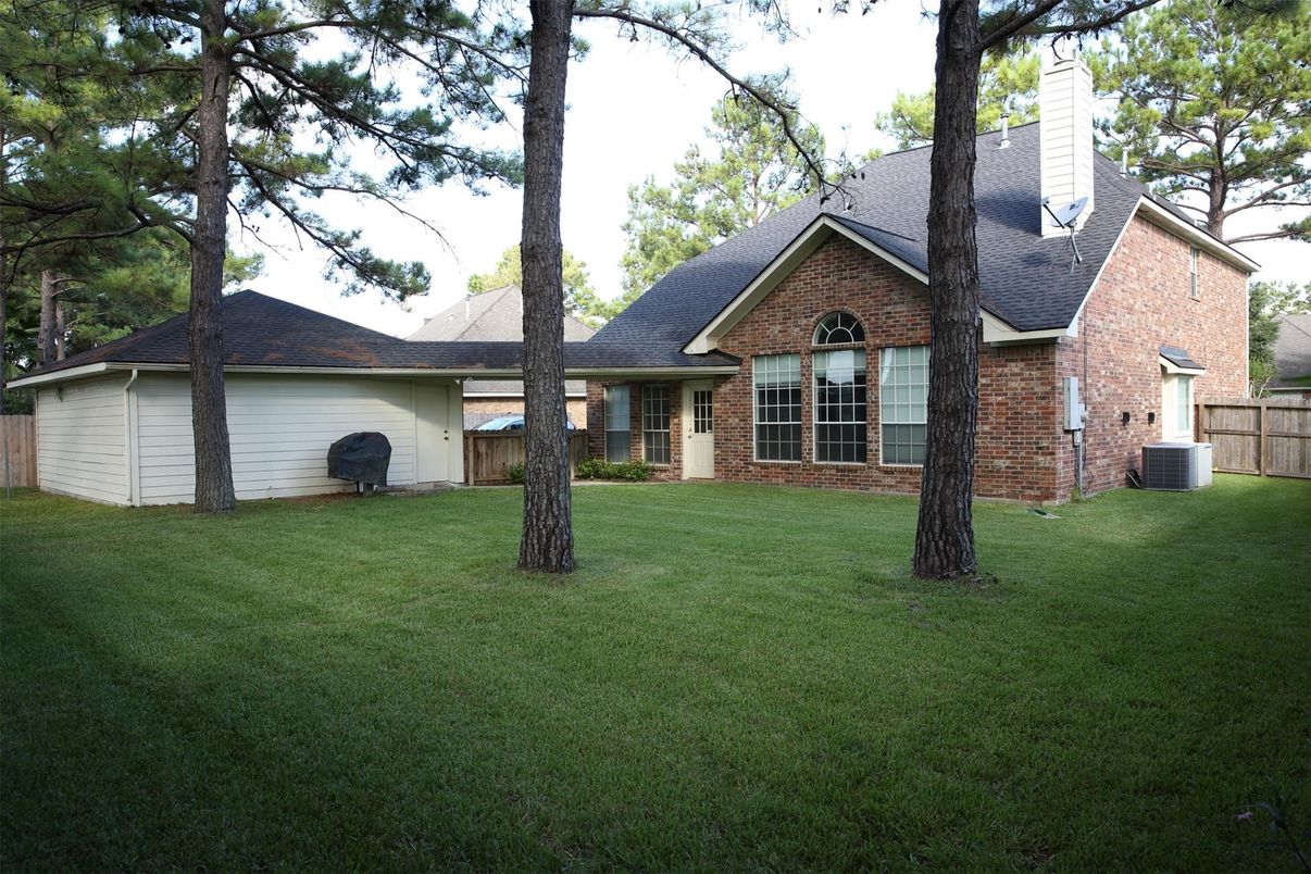 Attached, Backyard, Exterior, Facade, Brick Facade, Brick Traditional