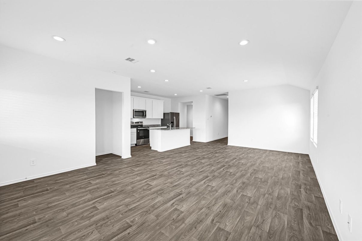 Empty room, Interior, Kitchen, Recessed Lighting, Stainless Steel Appliances, Wood Texture Flooring