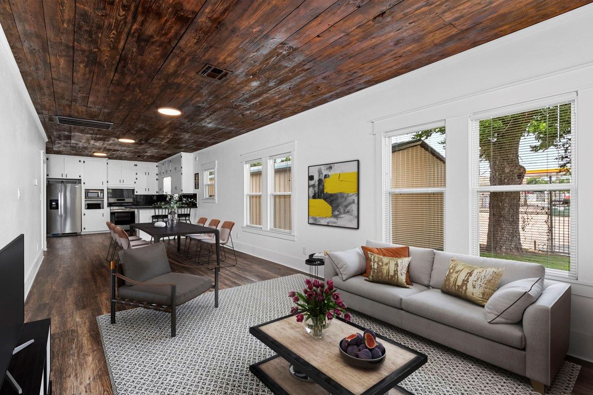 Dining room, Interior, Kitchen, Living room, Recessed Lighting, Stainless Steel Appliances, Wooden Ceilings, Wood Texture Flooring