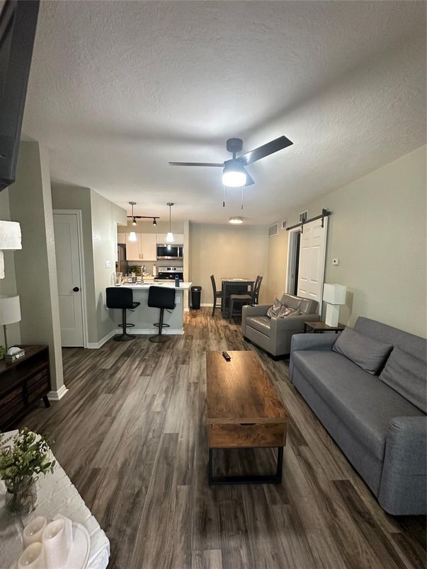 Dining room, Interior, Kitchen, Living room, Pendant Lights, Stainless Steel Appliances, Wood Texture Flooring