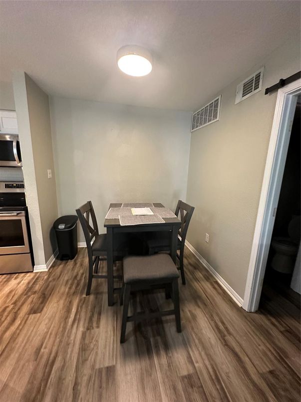 Dining room, Interior, Stainless Steel Appliances, Wood Texture Flooring