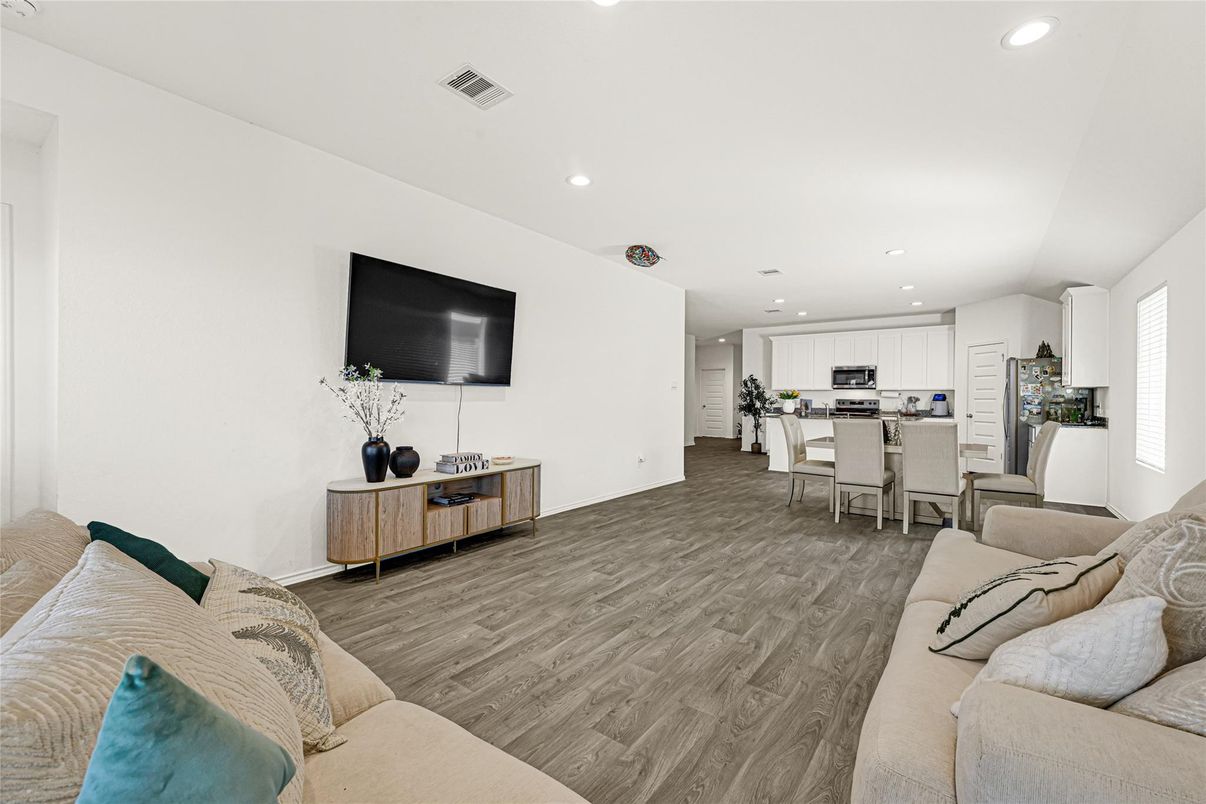 Dining room, Interior, Kitchen, Living room, Recessed Lighting, Stainless Steel Appliances, Wood Texture Flooring