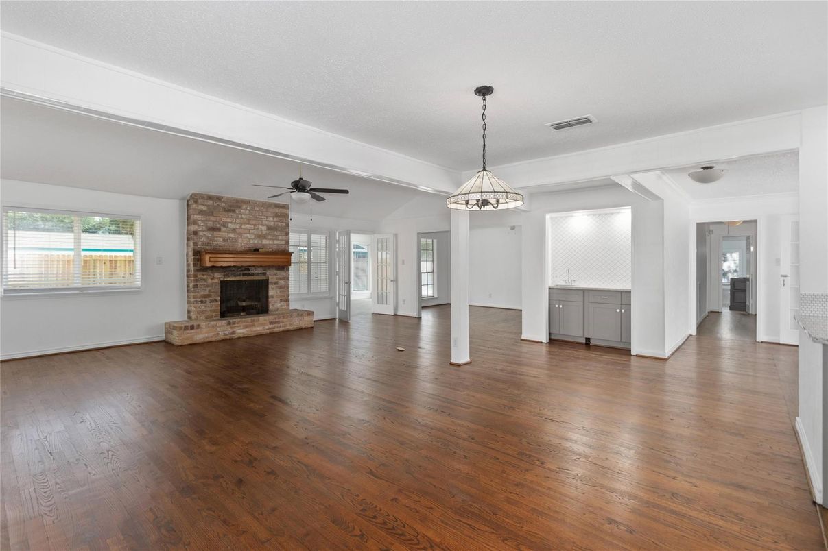 Empty room, Fireplace, Interior, Pendant Lights, Stone Walls, Wood Texture Flooring