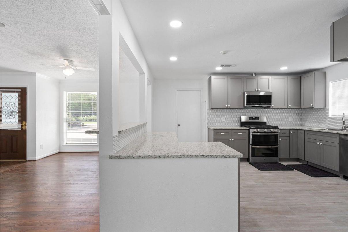 Interior, Kitchen, Recessed Lighting, Stainless Steel Appliances, Wood Texture Flooring