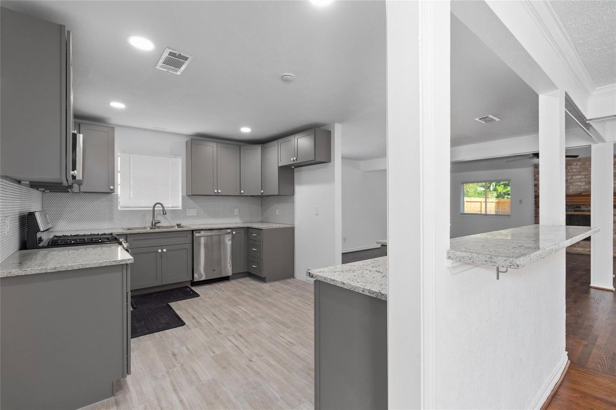 Interior, Kitchen, Recessed Lighting, Stainless Steel Appliances, Wood Texture Flooring