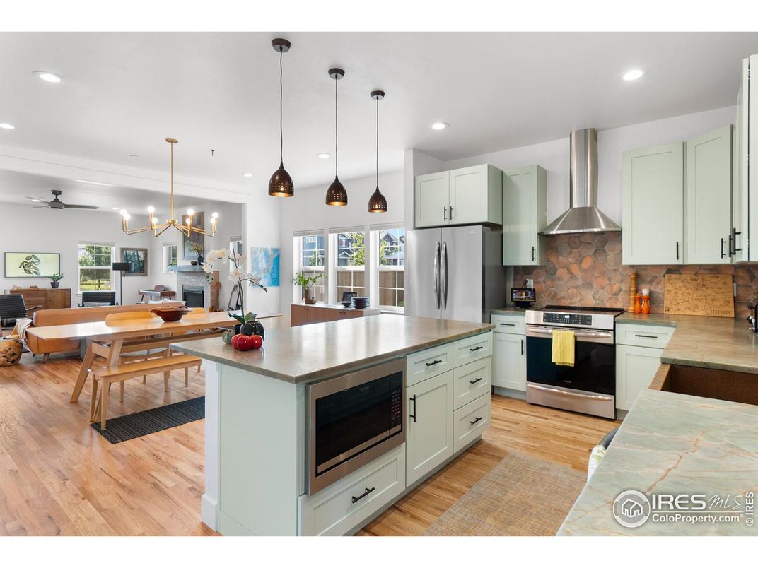 Dining room, Interior, Kitchen, Living room, Pendant Lights, Recessed Lighting, Stainless Steel Appliances, Wood Texture Flooring