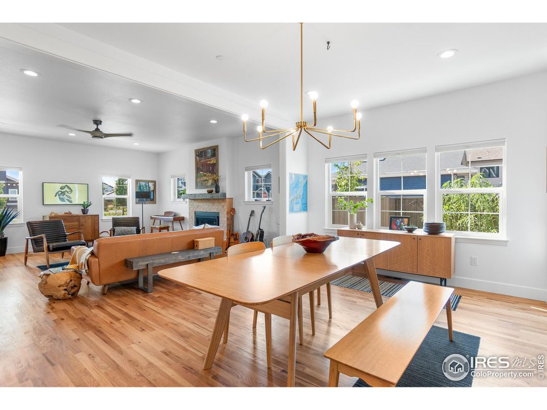 Chandelier, Dining room, Fireplace, Interior, Living room, Recessed Lighting, Wood Texture Flooring