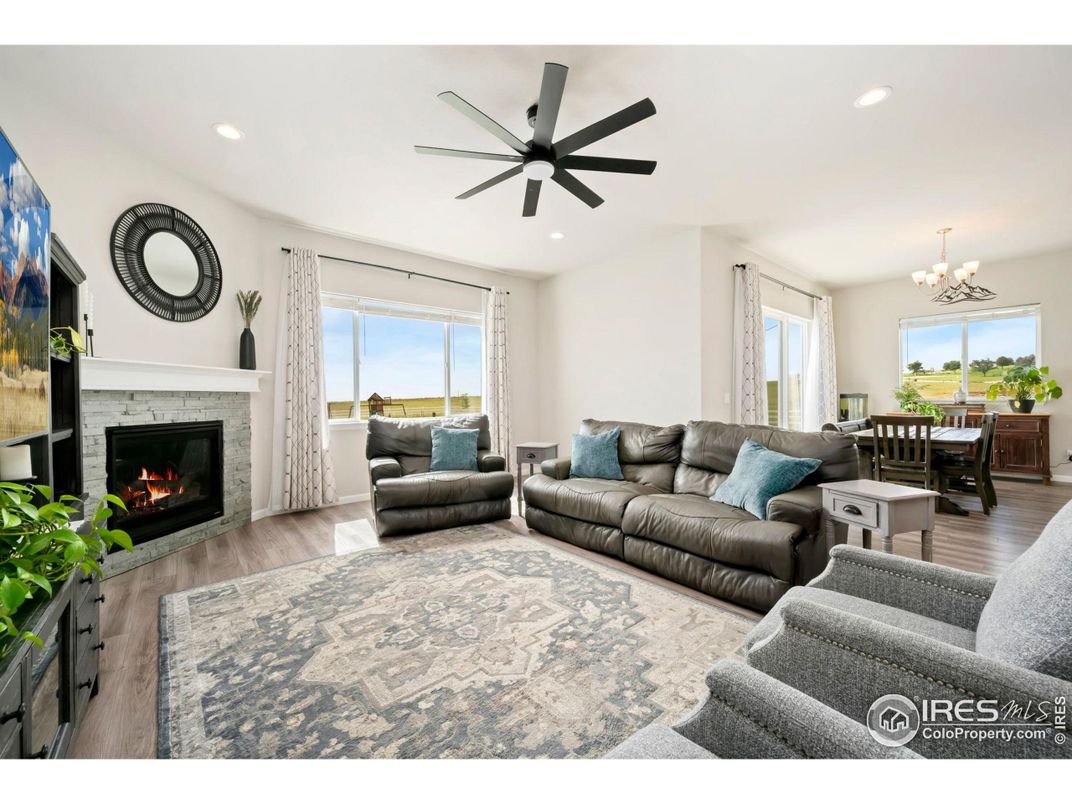 Chandelier, Dining room, Fireplace, Interior, Living room, Recessed Lighting, Wood Texture Flooring