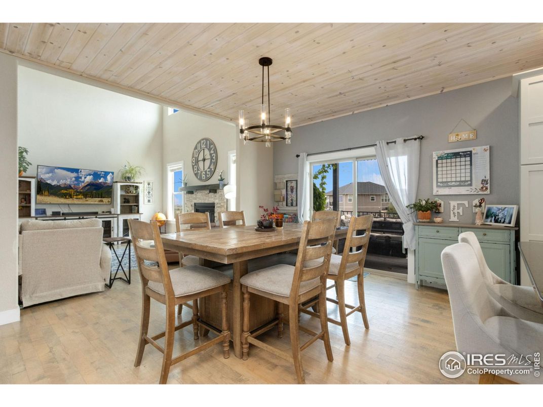 Chandelier, Dining room, Fireplace, Interior, Pendant Lights, Wooden Ceilings, Wood Texture Flooring