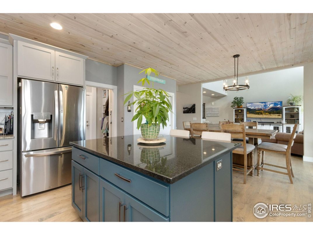 Dining room, Interior, Kitchen, Pendant Lights, Recessed Lighting, Stainless Steel Appliances, Wooden Ceilings, Wood Texture Flooring
