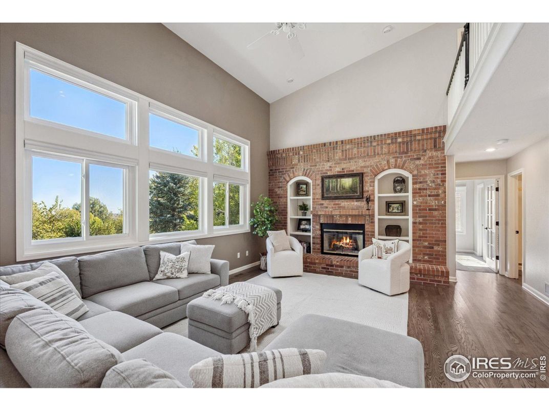 Fireplace, Interior, Living room, Recessed Lighting, Stone Walls, Wood Texture Flooring