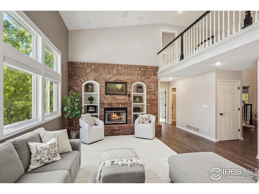 Fireplace, Interior, Living room, Recessed Lighting, Stone Walls, Wood Texture Flooring