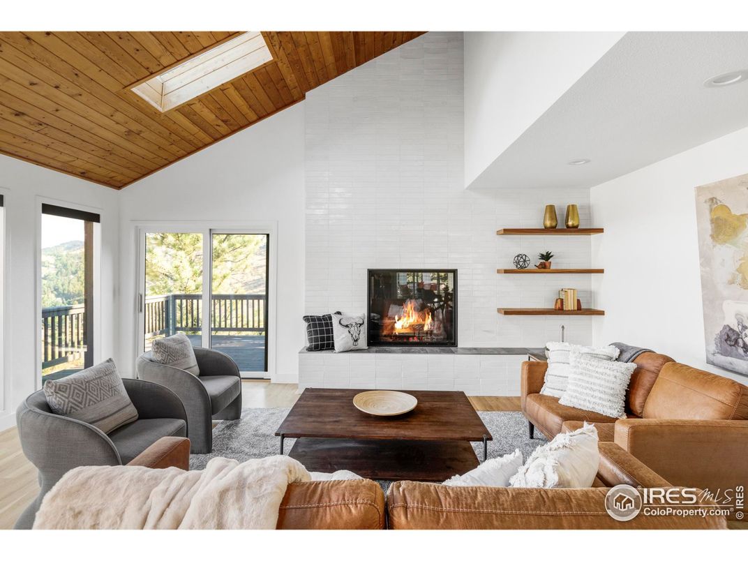 Fireplace, Interior, Living room, Recessed Lighting, Stone Walls, Wooden Ceilings