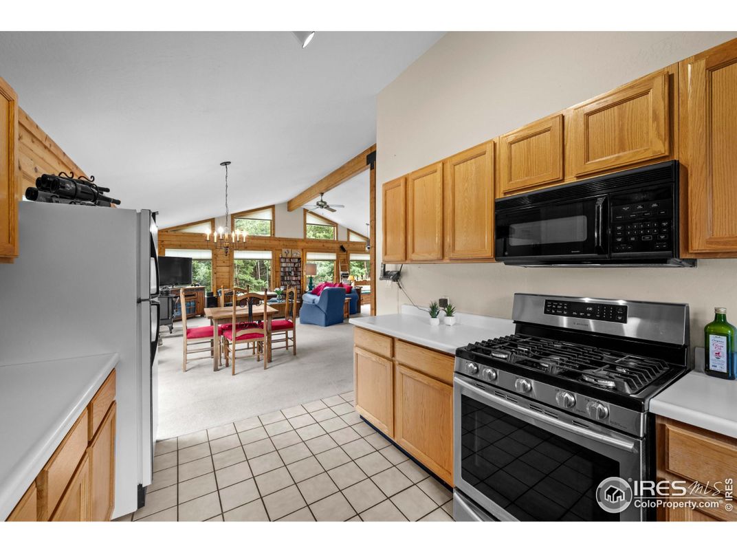 Chandelier, Dining room, Interior, Kitchen, Living room, Pendant Lights, Stainless Steel Appliances