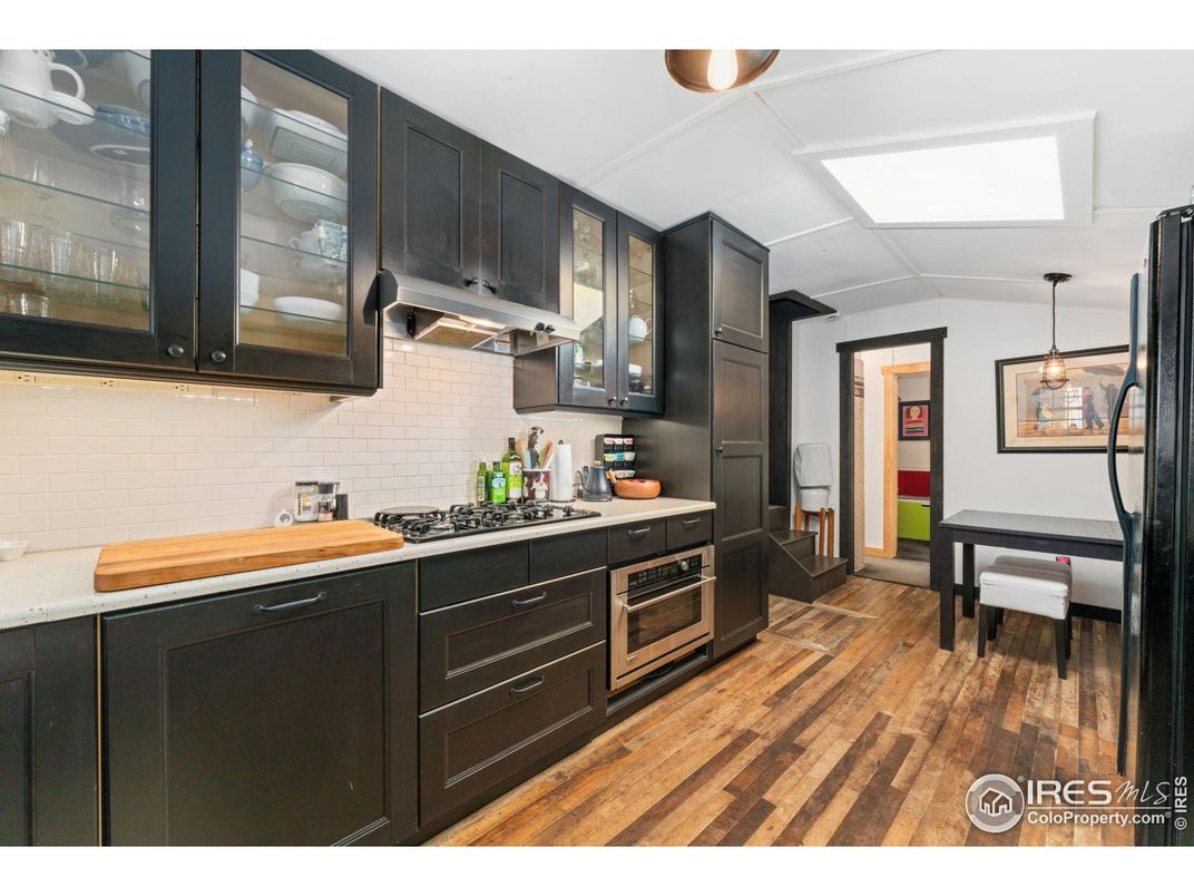 Dining room, Interior, Kitchen, Pendant Lights, Stainless Steel Appliances, Wood Texture Flooring