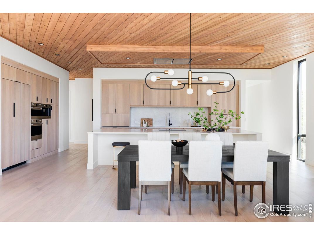 Dining room, Interior, Kitchen, Pendant Lights, Recessed Lighting, Stainless Steel Appliances, Wooden Ceilings, Wood Texture Flooring