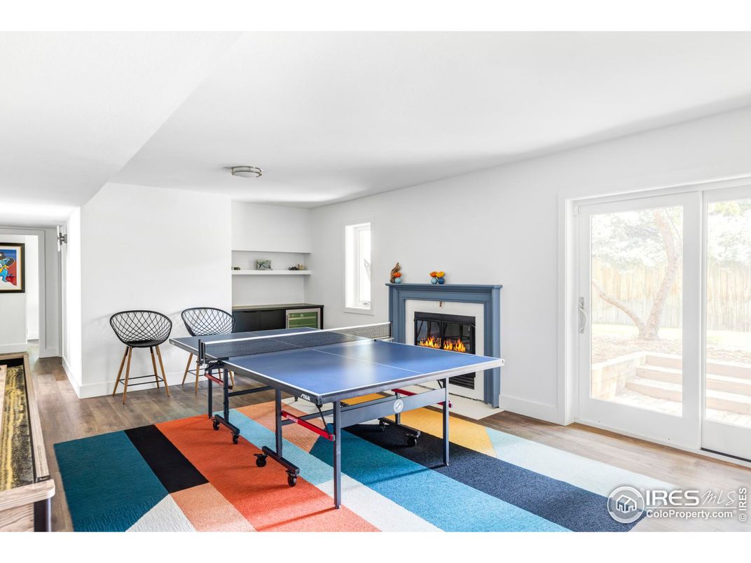 Fireplace, Game Room, Interior, Wood Texture Flooring