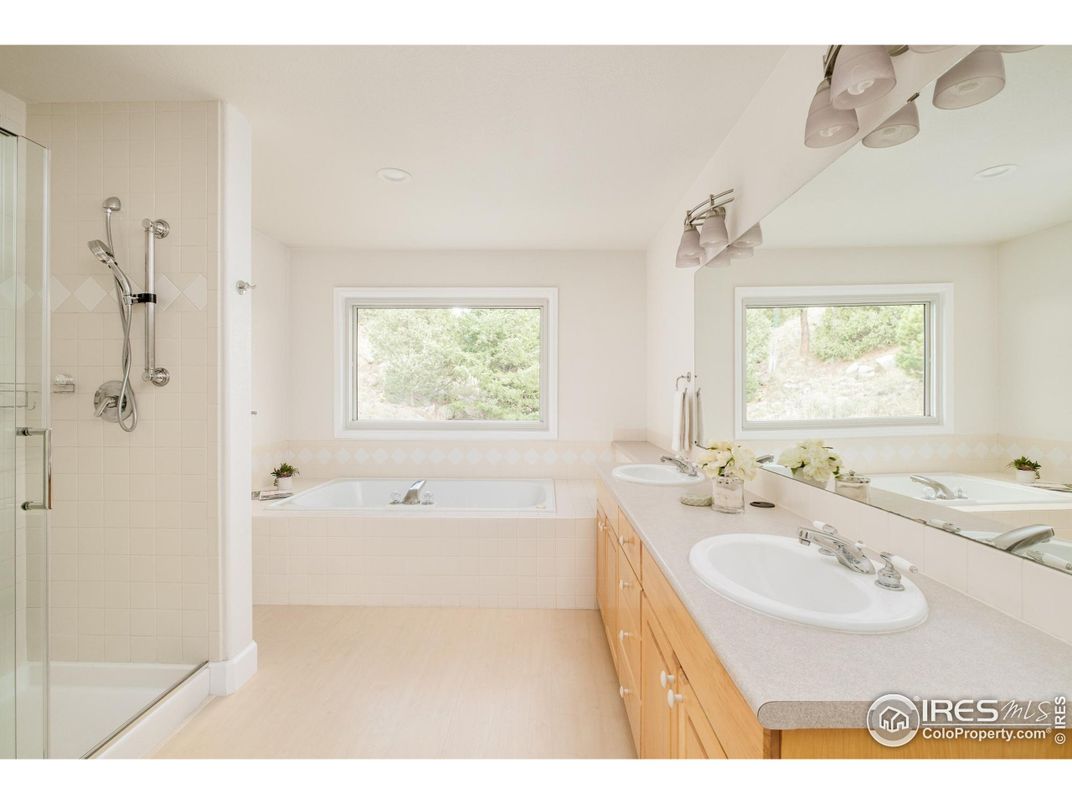 Bathroom, Dual Sink Vanities, Glass Shower, Interior, Recessed Lighting, Wood Texture Flooring