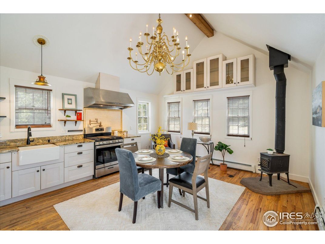 Chandelier, Dining room, Interior, Kitchen, Pendant Lights, Stainless Steel Appliances, Wooden Beams, Wood Texture Flooring