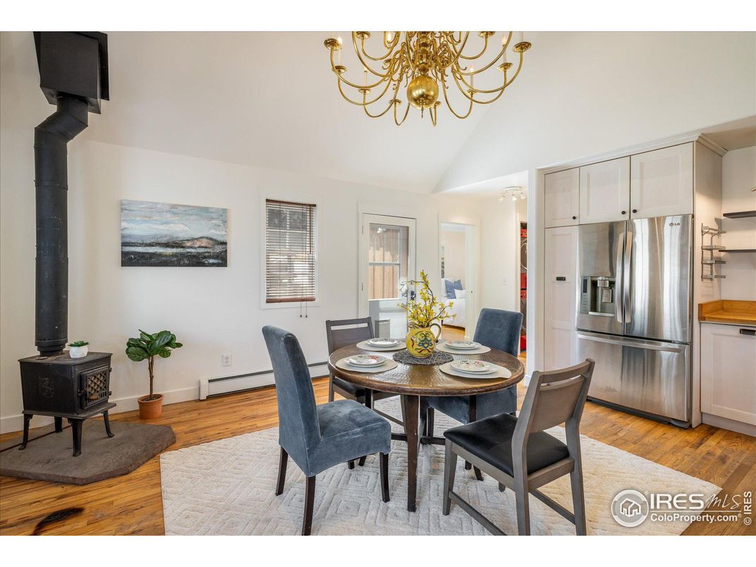 Chandelier, Dining room, Interior, Kitchen, Stainless Steel Appliances, Wood Texture Flooring