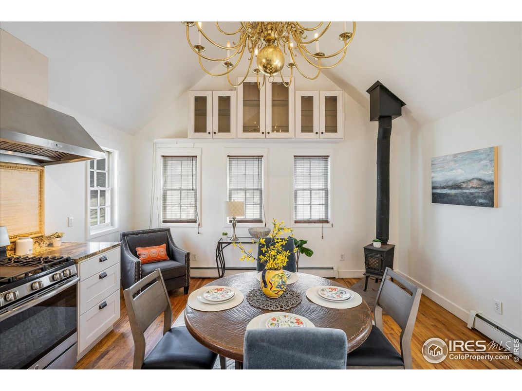 Chandelier, Dining room, Fireplace, Interior, Kitchen, Wood Texture Flooring
