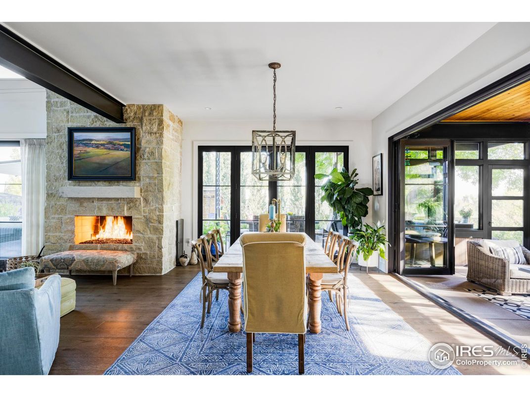 Dining room, Fireplace, Interior, Pendant Lights, Stone Walls, Wood Texture Flooring
