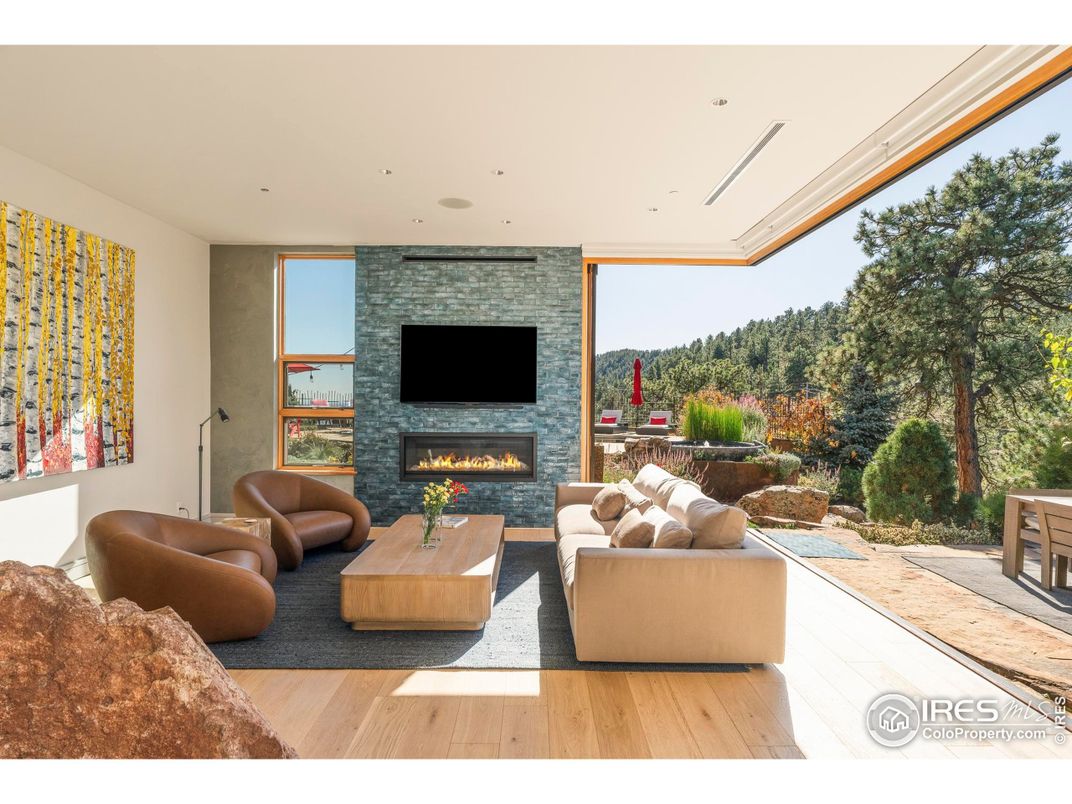 Fireplace, Interior, Living room, Recessed Lighting, Stone Walls, Wood Texture Flooring