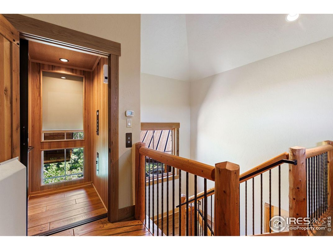 Elevator, Interior, Recessed Lighting, Wood Texture Flooring, Wooden Walls