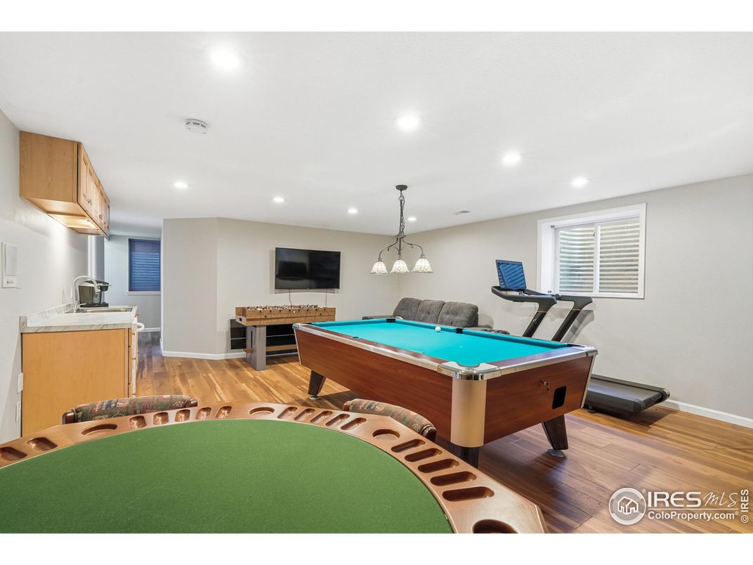 Billiard Table, Fitness Equipment, Game Room, Interior, Pendant Lights, Recessed Lighting, Wood Texture Flooring
