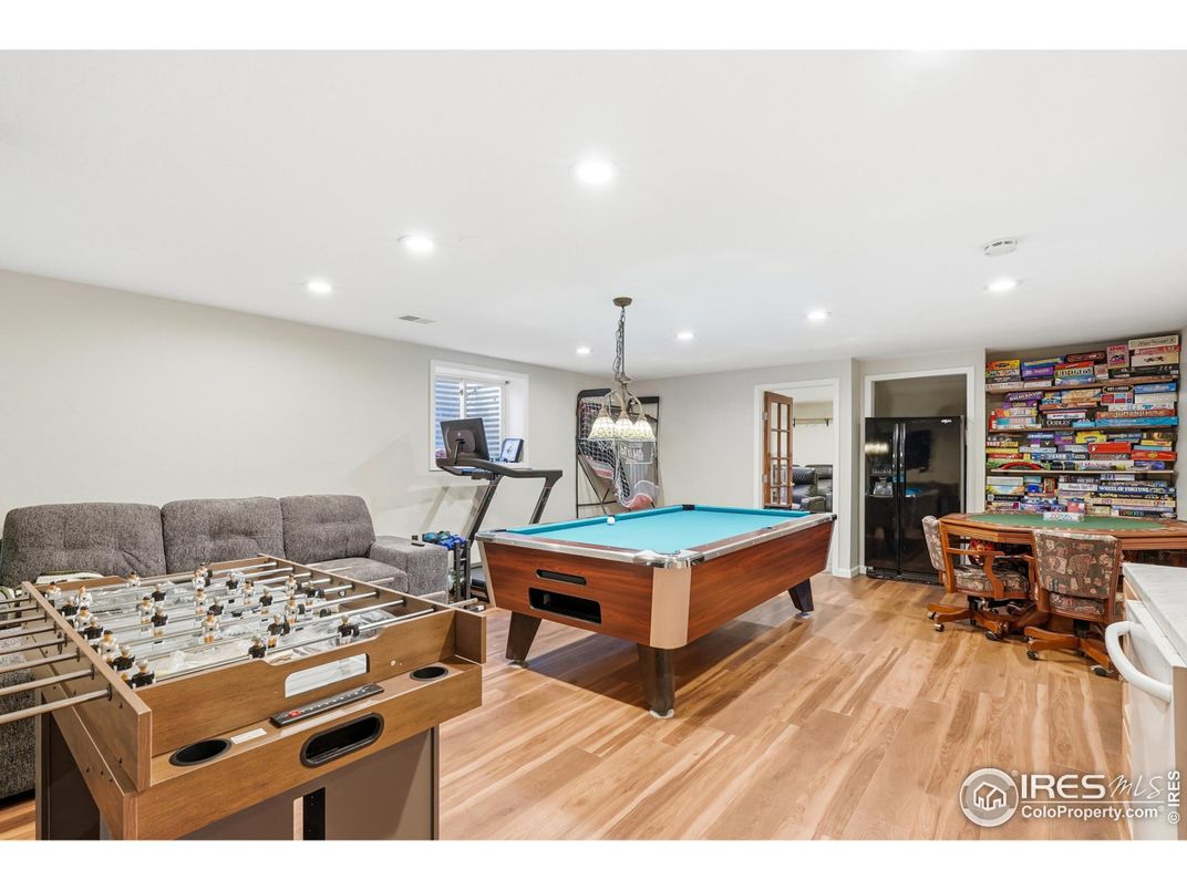 Billiard Table, Fitness Equipment, Game Room, Interior, Pendant Lights, Recessed Lighting, Wood Texture Flooring
