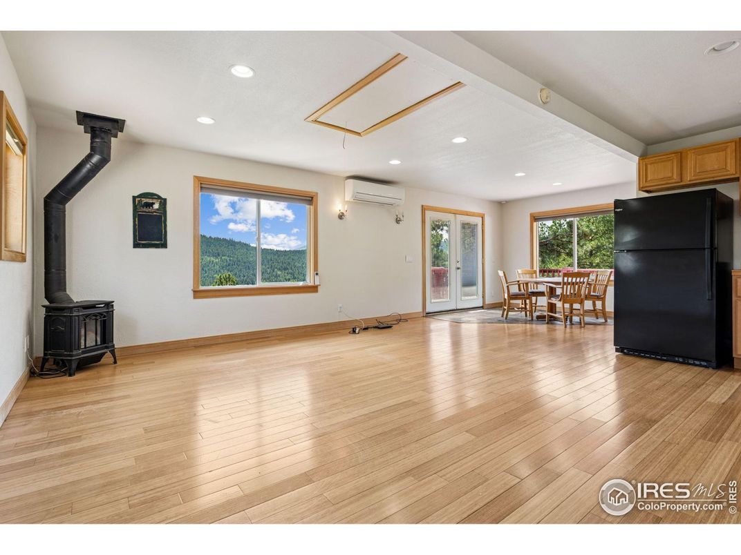Dining room, Fireplace, Interior, Pendant Lights, Recessed Lighting, Wood Texture Flooring